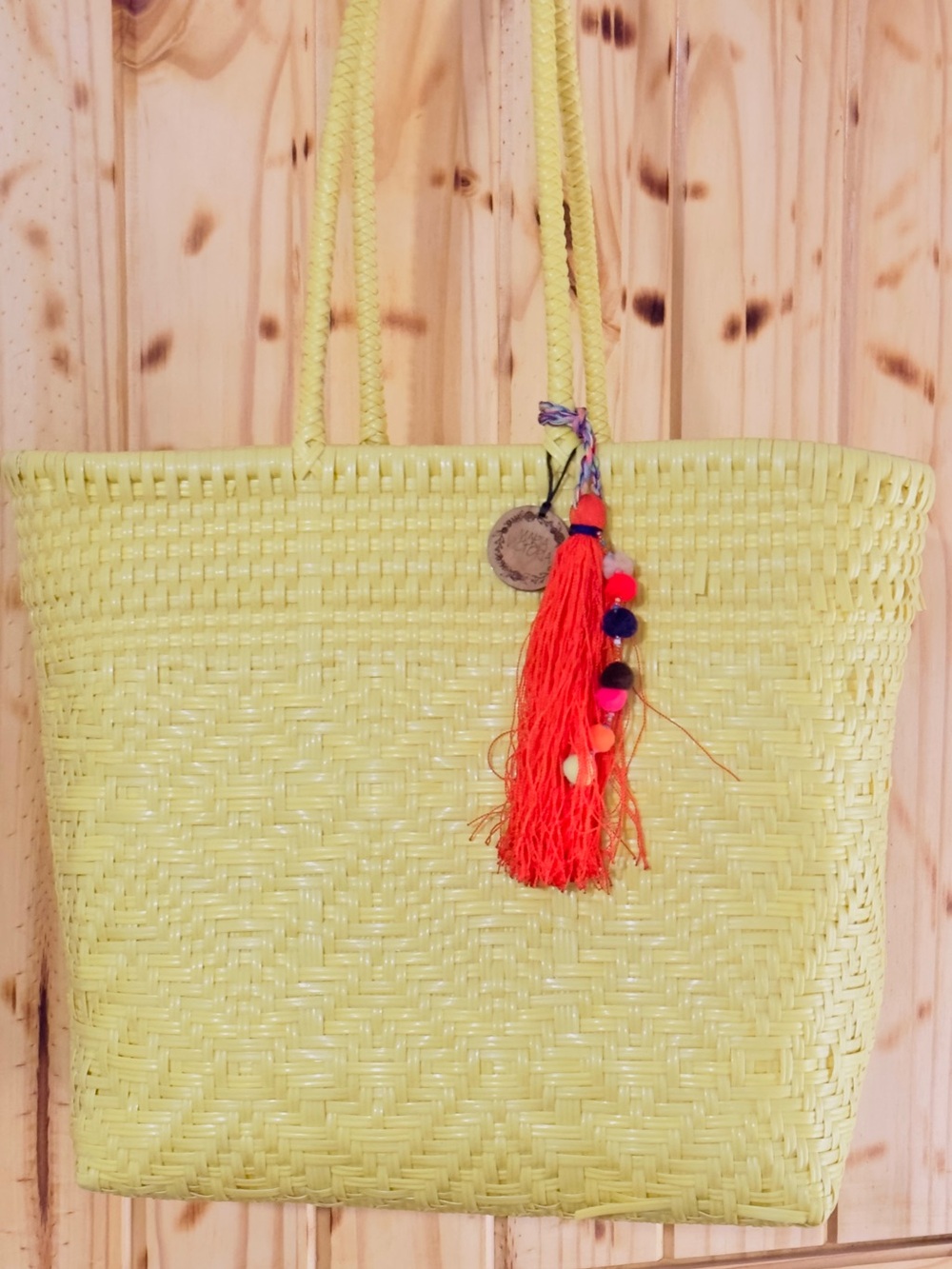 Maria Victoria Yellow Woven Tote with Red Tassel Charm